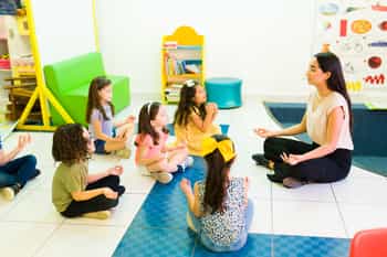 kids doing yoga to regulate at school